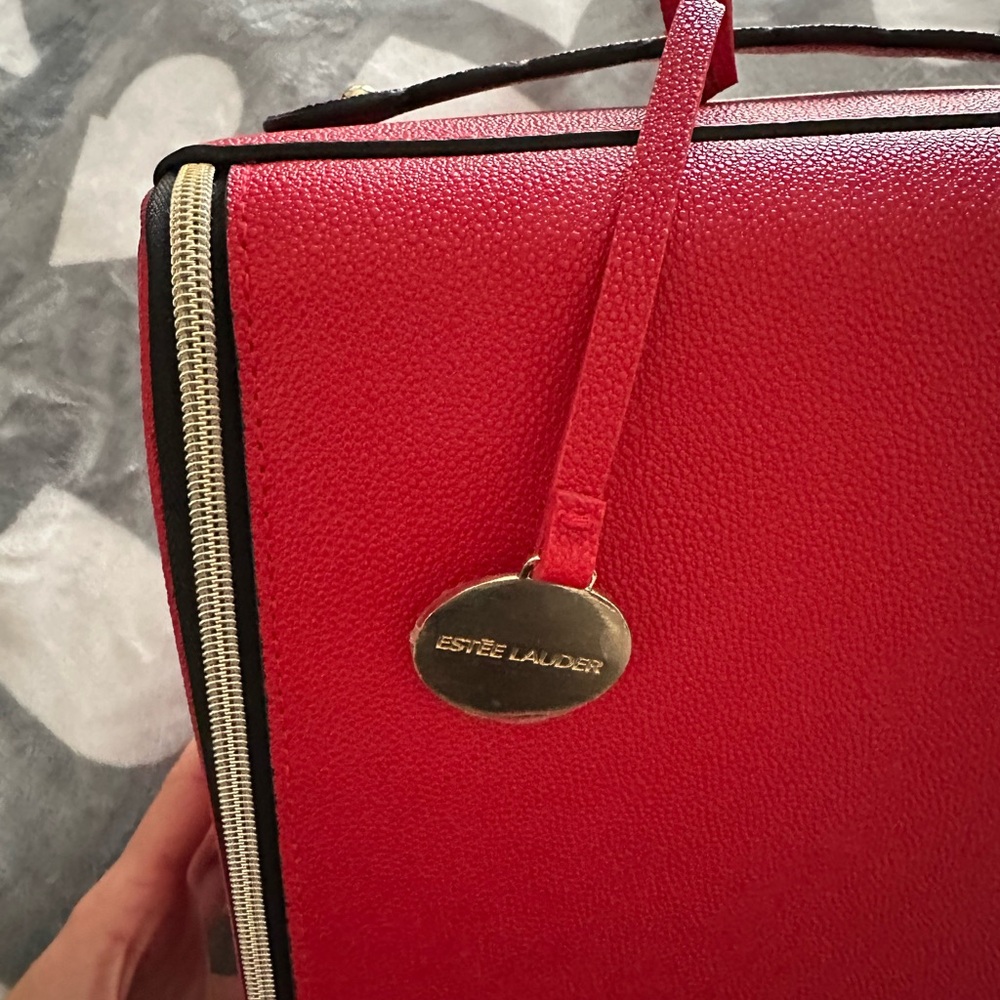 New Estee Lauder travel bag red and gold faux leather